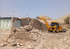 اجرای عملیات تعریض جاده شیخ مندنی با تخریب دیوار توسط شهرداری مسجدسلیمان