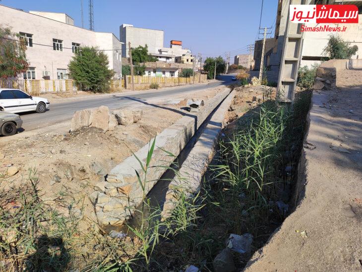 اجرای عملیات احداث کانال دفع آبهای سطحی جنب پایانه مسافربری نفتک